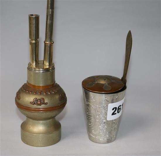 A Chinese nickel and copper travelling waterpipe, a scroll weight, a paperknife and a white metal beaker Pipe 30cm